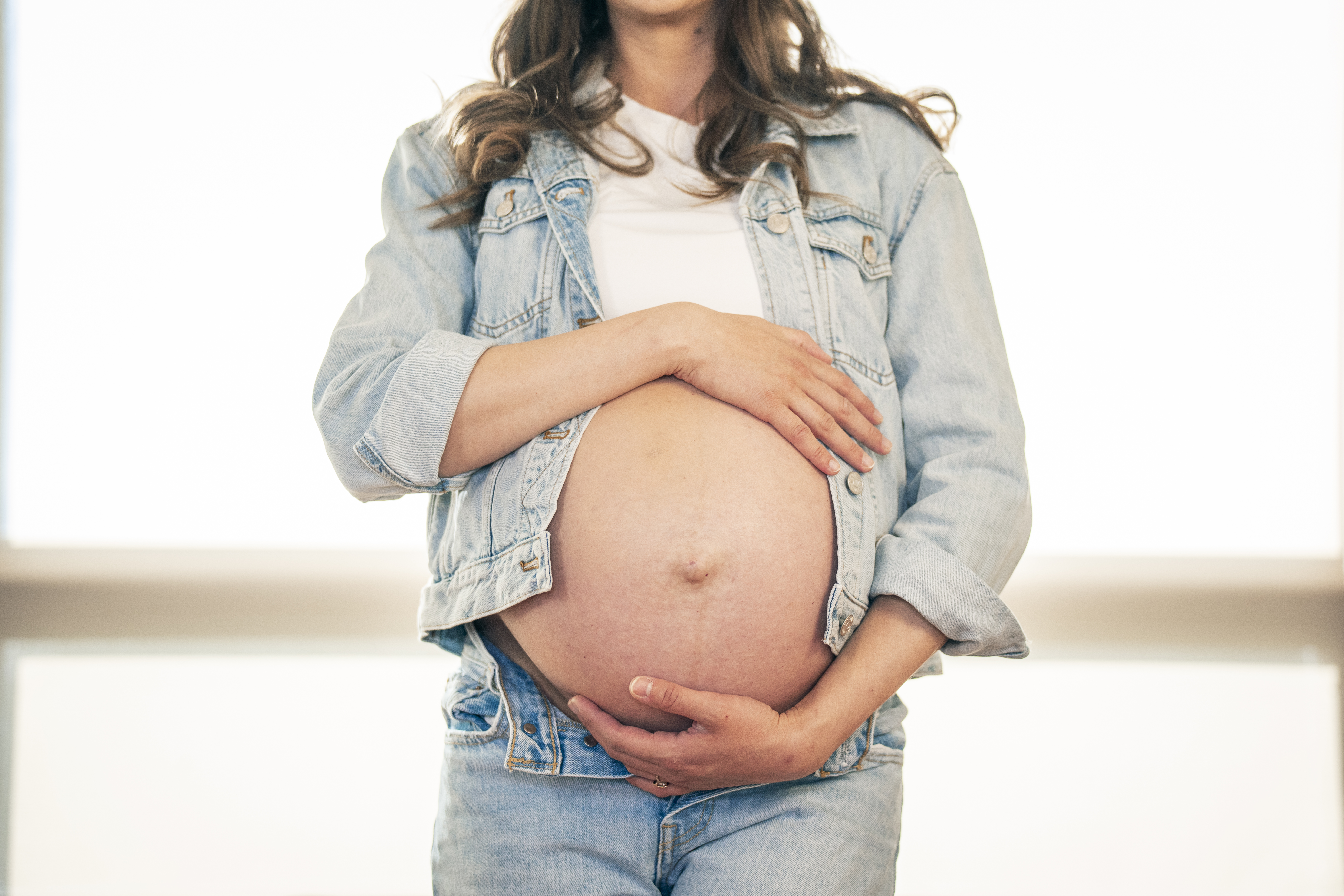 Expecting mother in a field